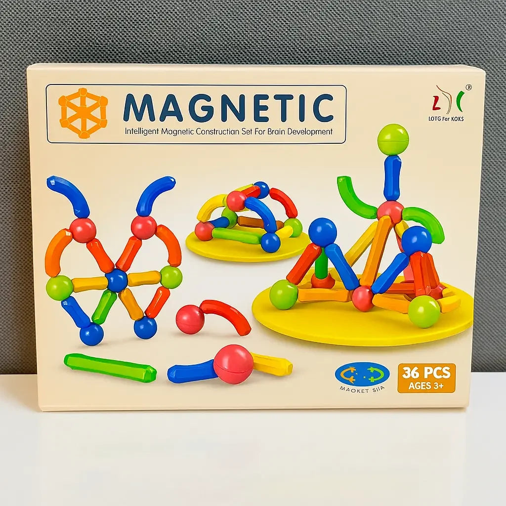 Magnetic construction toy set in its retail packaging, featuring colorful plastic rods and balls on a cream-colored box with illustrations of built structures.